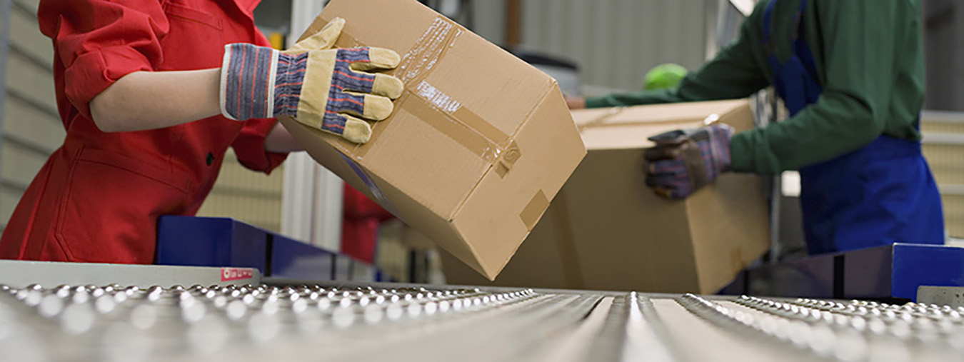 Workers with boxes and conveyor belt